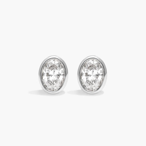 Bezel Diamond Stud Earrings with Oval Cut Diamonds