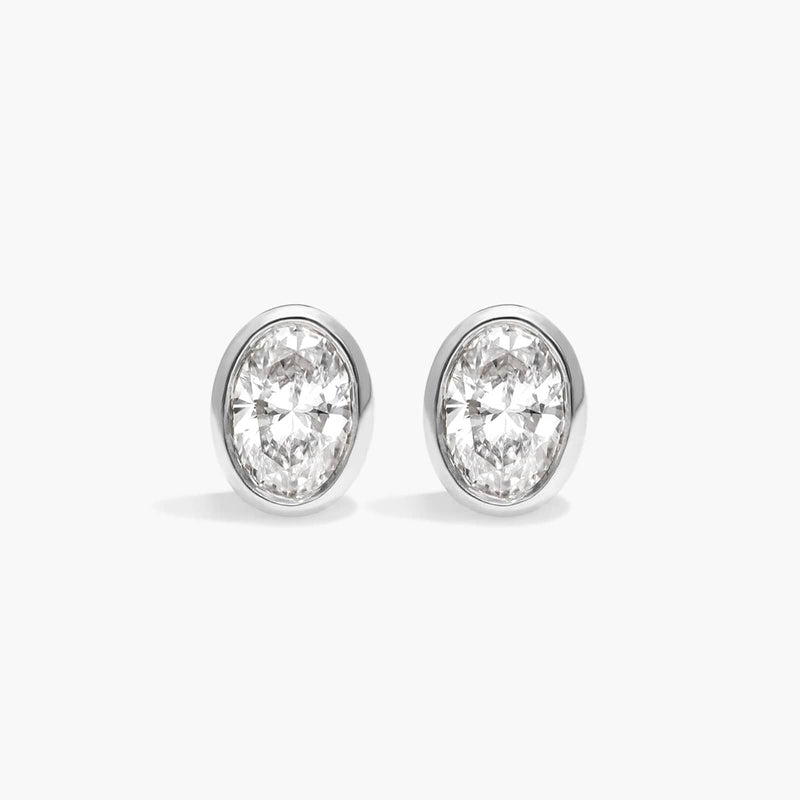 Bezel Diamond Stud Earrings with Oval Cut Diamonds