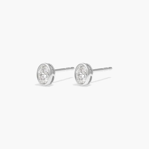 Bezel Diamond Stud Earrings with Oval Cut Diamonds