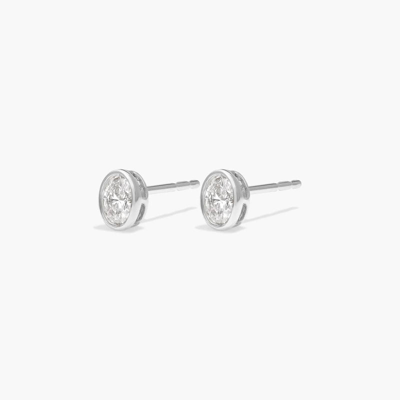 Bezel Diamond Stud Earrings with Oval Cut Diamonds