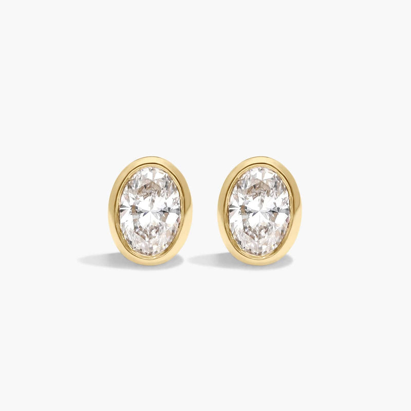 Bezel Diamond Stud Earrings with Oval Cut Diamonds